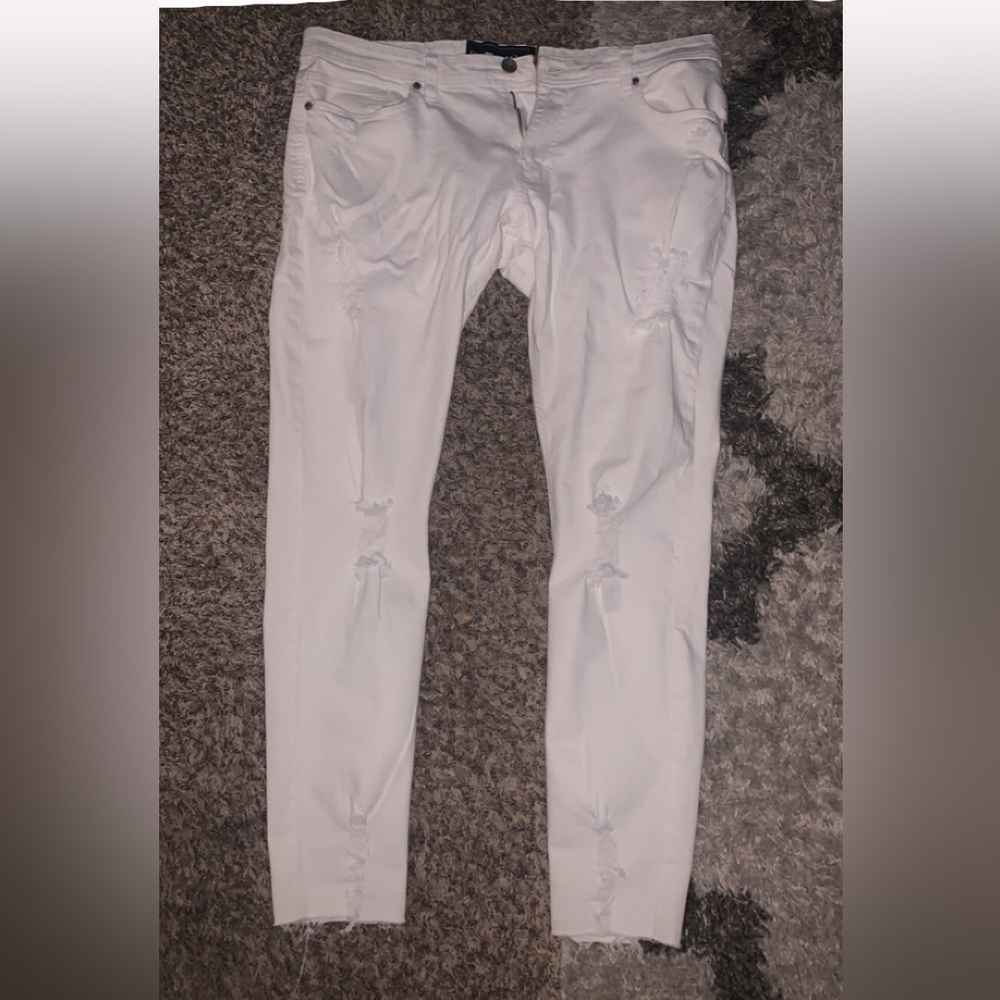 Skinny ripped white jeans